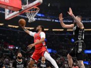 Ivika Jubac 122-117 Surgindo os Clippers cruzando o esparso e o quarto no oeste da multidão