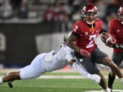 Os texanos são combinados com o estado de Washington W. Kyle Williams para visitar pré-troncos