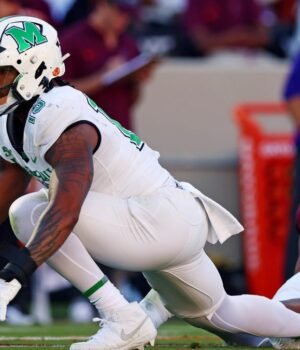 83156913007-20240907-t-213043-z-1087561558-mt-1-usatoday-24178677-rtrmadp-3-ncaafootballmarshallatvi.jpeg