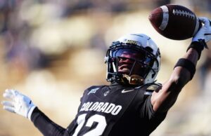 Qual é o custo dos Patriots negociando para Travis Hunter?