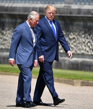 95730819-14623641-US_President_Donald_Trump_R_is_greeted_by_Prince_Charles_Prince_-a-3_1744922174289.jpeg