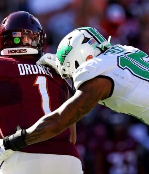 83344087007-20240907-t-213049-z-820141742-mt-1-usatoday-24178682-rtrmadp-3-ncaafootballmarshallatvir.jpeg