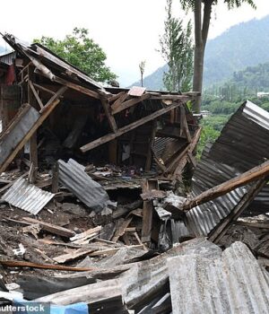98227221-14697371-A_view_of_a_damaged_shops_that_was_destroyed_by_Pakistani_artill-a-17_174683069221.jpeg
