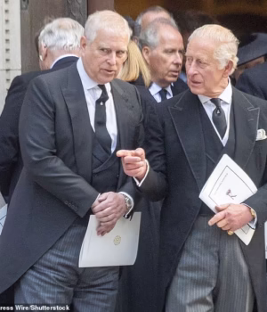 103330283-15229115-King_Charles_talking_to_his_brother_Prince_Andrew_on_the_steps_o-a-24_17615121131.avif