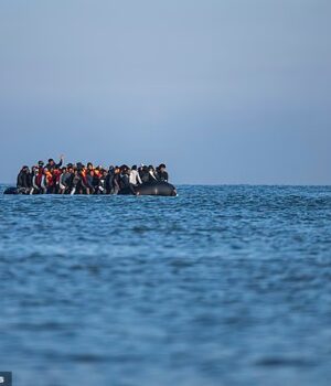 103910509-15294237-Migrants_crossing_the_Channel_on_inflatable_boats-a-41_1763239272974.jpg