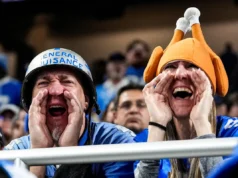 Os fãs reagem após a derrota dos Leões no Dia de Ação de Graças para os Packers