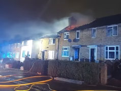 O menino e dois adultos foram levados ao hospital depois que o telhado desabou e 70 bombeiros correram para o local.