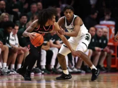 O número 7 do estado de Michigan escapa de Rutgers com vitória na prorrogação depois de eliminar o déficit de 12 pontos no segundo tempo