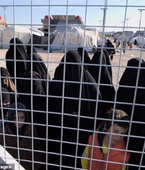 106397393-15561165-Families_of_IS_members_held_in_Syrian_camps_are_seeking_to_retur-a-25_17711165360.avif