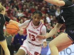 Wisconsin mostrou resiliência com um retorno, mas caiu para a 25ª posição em Washington no OT