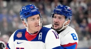 Confronto épico do jogo de hóquei pela medalha de ouro olímpica entre Canadá e EUA