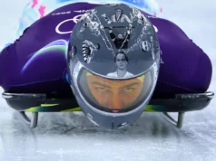 Luta olímpica com uma questão escorregadia: certos atletas deveriam ter permissão para atuar?