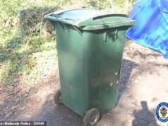 Dois homens e uma mulher foram presos depois que um homem foi encontrado morto em uma lata de lixo, que ‘pode ter sido atropelado por um carro’