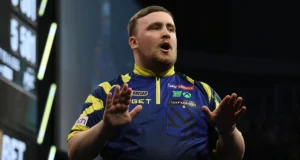 Dardos da Premier League: Littler Cardiff venceu Rock sem vitórias para chegar às semifinais