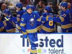 Thompson teve a honra de ganhar a medalha de ouro olímpica e depois marcou na vitória dos Sabres por 3 a 2 sobre os Cavaleiros de Ouro.