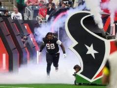 O ex-texanos DL Tim Settle retornou a Washington com um contrato de três anos