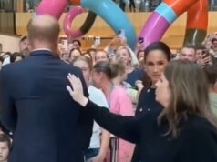 Momento emocionante: Meghan Markle encara um conselheiro enquanto a filmagem captura um ato delicado que faz a Duquesa cair na gargalhada