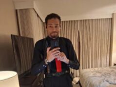 Novas imagens horríveis mostram um homem armado do WHCD vigiando um hotel e o momento em que ele tenta passar por um posto de segurança
