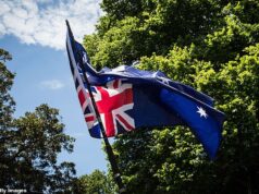Por que tem havido uma tendência em Victoria de os residentes hastearem a bandeira australiana fora de suas propriedades