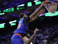 O rosto surpreso de Joel Embiid enquanto posterizava está em um museu