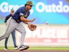 O que estava acontecendo com as calças do árbitro no jogo dos Brewers na sexta-feira?