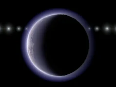 Este minúsculo sistema solar exterior tem uma atmosfera. Não deveria