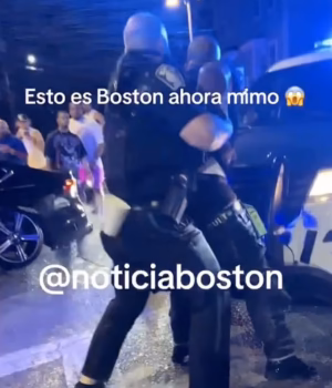109703471-15941305-A_Boston_cop_was_surrounded_by_a_unruly_crowd_as_they_threw_liqu-a-1_178285138819.avif
