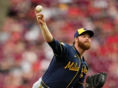 Os Brewers venceram os Reds por 2 a 1 na recuperação de Woodruff no topo do 10º e no sacrifício de Ortiz