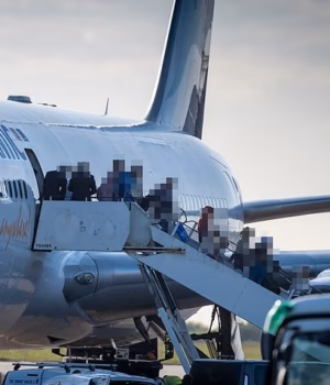 100296583-16012367-The_Daily_Mail_watched_hundreds_of_migrants_filing_off_a_taxpaye-a-1_178528916282.avif