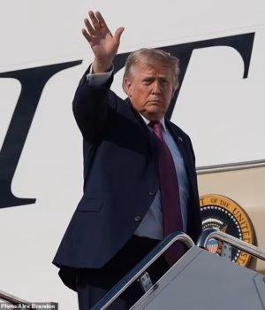 109787197-15951709-Trump_is_seen_here_boarding_the_new_Air_Force_One_on_Friday_nigh-a-18_17831224206.avif