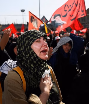 109795503-15952895-A_woman_mourns_on_the_day_of_a_public_farewell_ceremony_to_pay_t-m-11_17831772043.avif