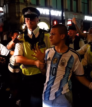 110046427-15981399-Police_in_London_escort_an_Argentinian_fan_away_from_England_sup-a-1_178418096111.avif