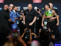 Conor McGregor joga os óculos de sol de Max Holloway na pré-luta do UFC 329