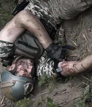 wounded-soldier-on-ground.webp
