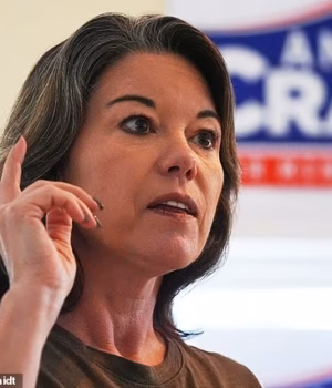110284153-16042235-Angie_Craig_speaks_to_constituents_during_a_door_knocking_event_-a-1_178648288469.avif