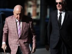 A equipe de defesa de agressão indecente de Alan Jones está questionando se a ex-namorada do acusador do titã do talkback recebeu dinheiro para testemunhar