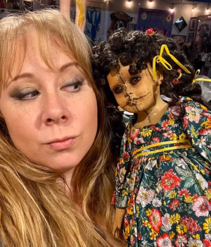 110772671-16069701-Katrina_Maclean_poses_with_an_eerie_doll_Maclean_47_was_the_owne-a-4_178731610301.avif