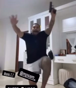 110946203-16092117-Alleged_Coconut_Cartel_member_Iziah_Utai_shared_a_video_of_him_d-m-19_17881699724.avif