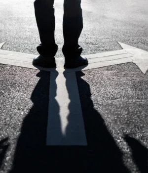businessman-choices-decision-arrows-road.webp