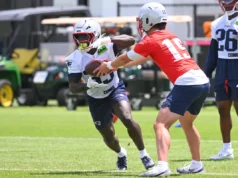 Patriots assinam escolha anterior da quarta rodada do draft, desistindo do novato RB