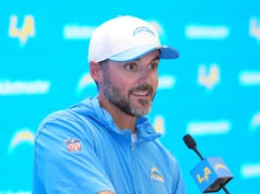 Ravens HC Jese Minter canaliza sua estrela do rap interior na frente de seus jogadores