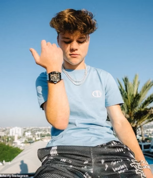 110704893-16061101-Jack_Doherty_pictured_showing_off_his_luxury_watch_has_amassed_m-a-7_178856092629.avif