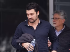 O jogador de futebol listado na AFL bateu em sua ex-parceira modelo em uma fúria bêbada por causa da aparição de seu ex-time na grande final – e então exigiu que ele e sua ‘igreja’ colocassem seus filhos em um orfanato