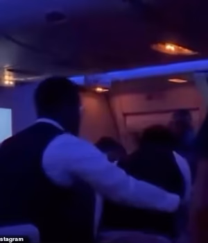 111213605-16126721-Footage_captured_the_moment_chaos_broke_out_on_an_international_-m-14_17892553356.avif