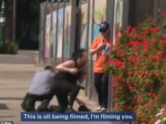Uma corrida explode em violência quando uma mulher é ferida após um confronto com voluntários