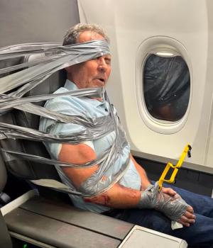 111286349-16135995-Passengers_bound_Lundeen_to_his_chair_and_the_plane_was_forced_t-a-17_17895703771.avif