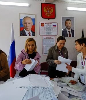 111370913-16150441-Members_of_a_local_electoral_commission_count_votes-a-3_1790065859263.jpg