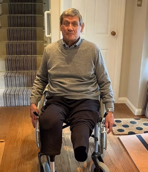 111372341-16147611-Nic_Olsen_80_lost_both_of_his_legs_after_it_took_four_years_for_-m-8_178998965511.avif