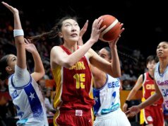 Han Zhu leva a China às quartas de final com a França depois de vencer Porto Rico por 75-72