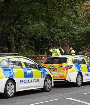 111401217-16180307-Police_guarded_an_address_in_Manchester_after_the_two_men_were_a-a-1_179102682847.avif